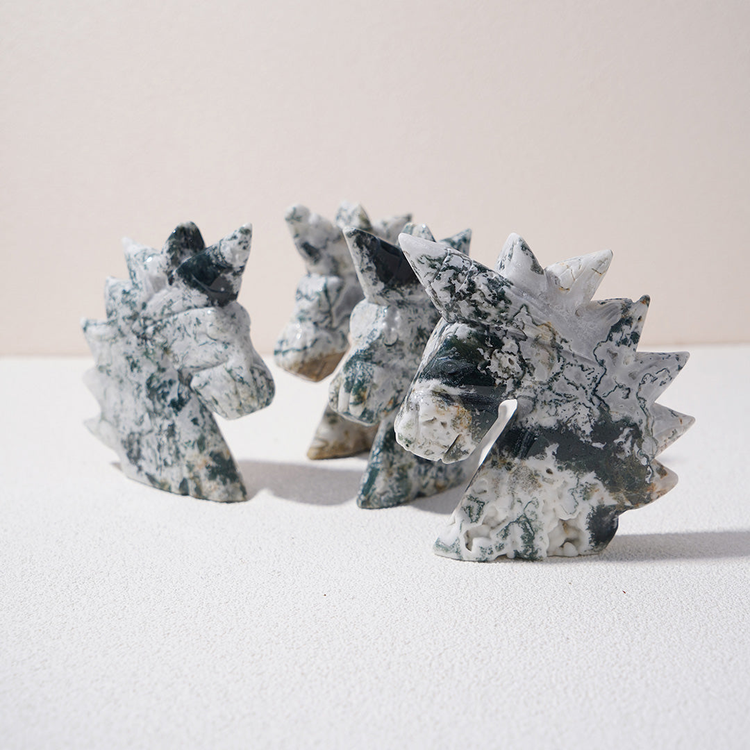 Moss agate unicorn carving